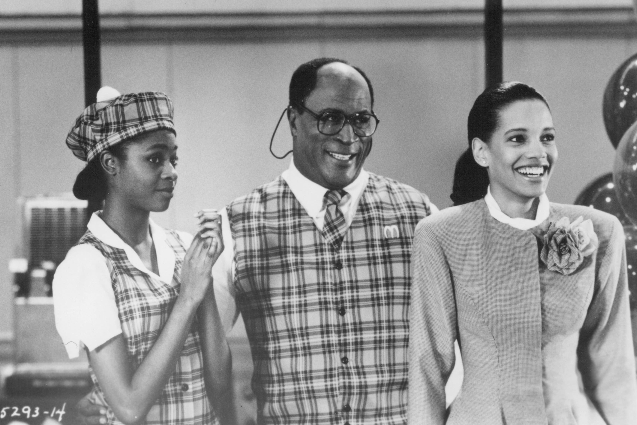 Still of John Amos, Allison Dean and Shari Headley in Coming to America (1988)