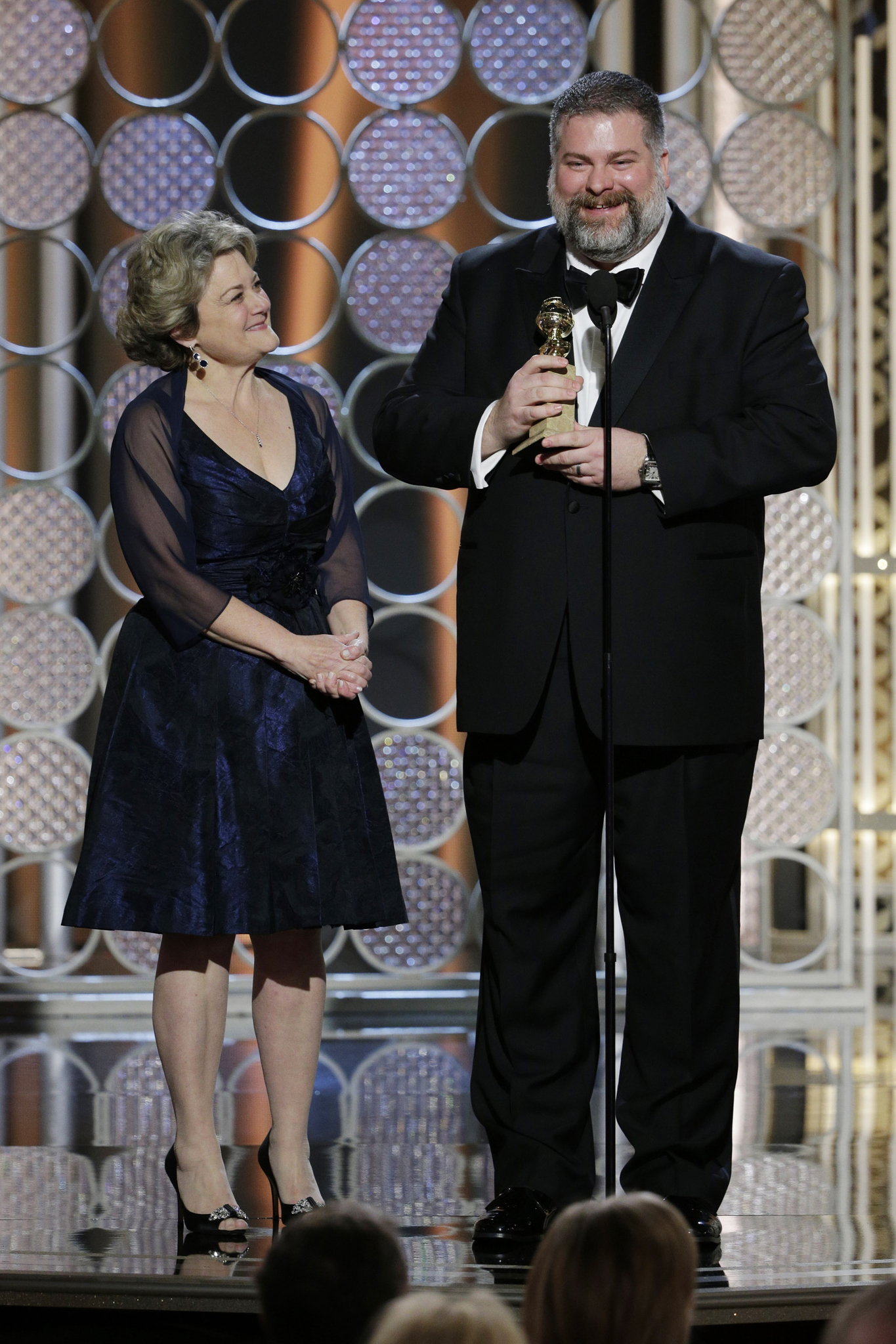 Bonnie Arnold and Dean DeBlois at event of 72nd Golden Globe Awards (2015)