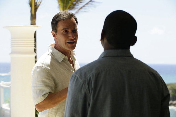 Still of Mekhi Phifer and Tim DeKay in Aferistas (2009)