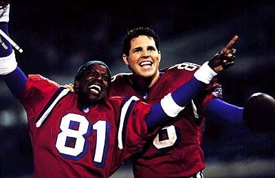 Still of David Denman and Orlando Jones in The Replacements (2000)