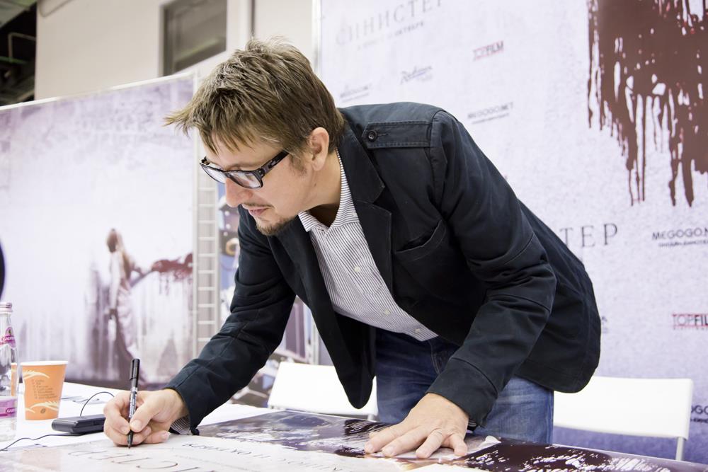 Signing Sinister posters in Moscow, Russia