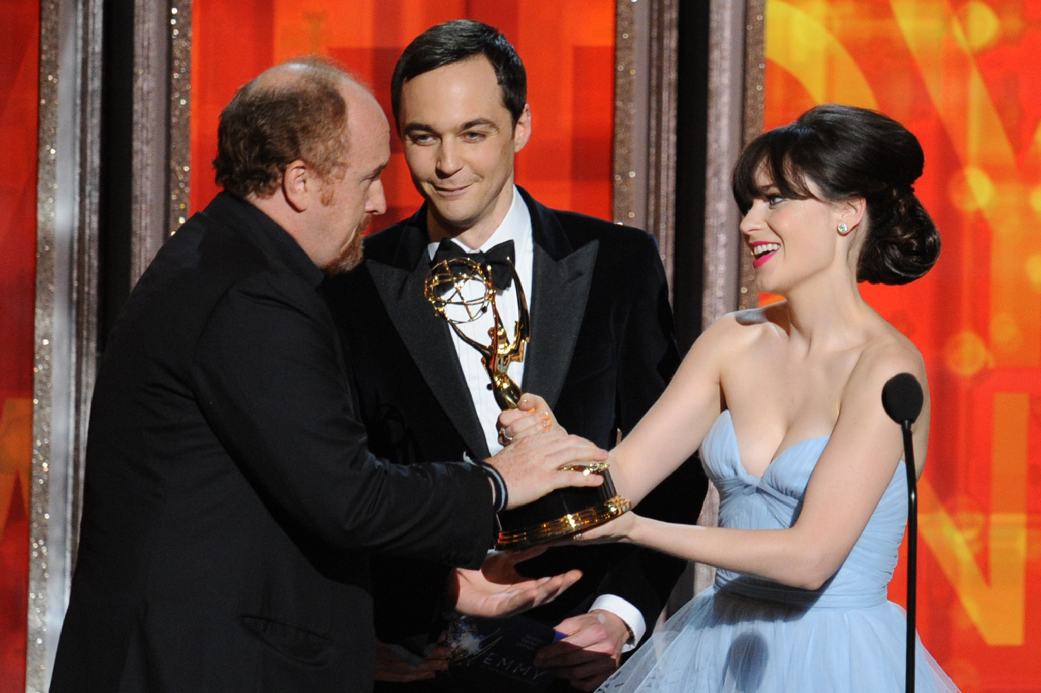 Louis C.K., Zooey Deschanel and Jim Parsons at event of The 64th Primetime Emmy Awards (2012)