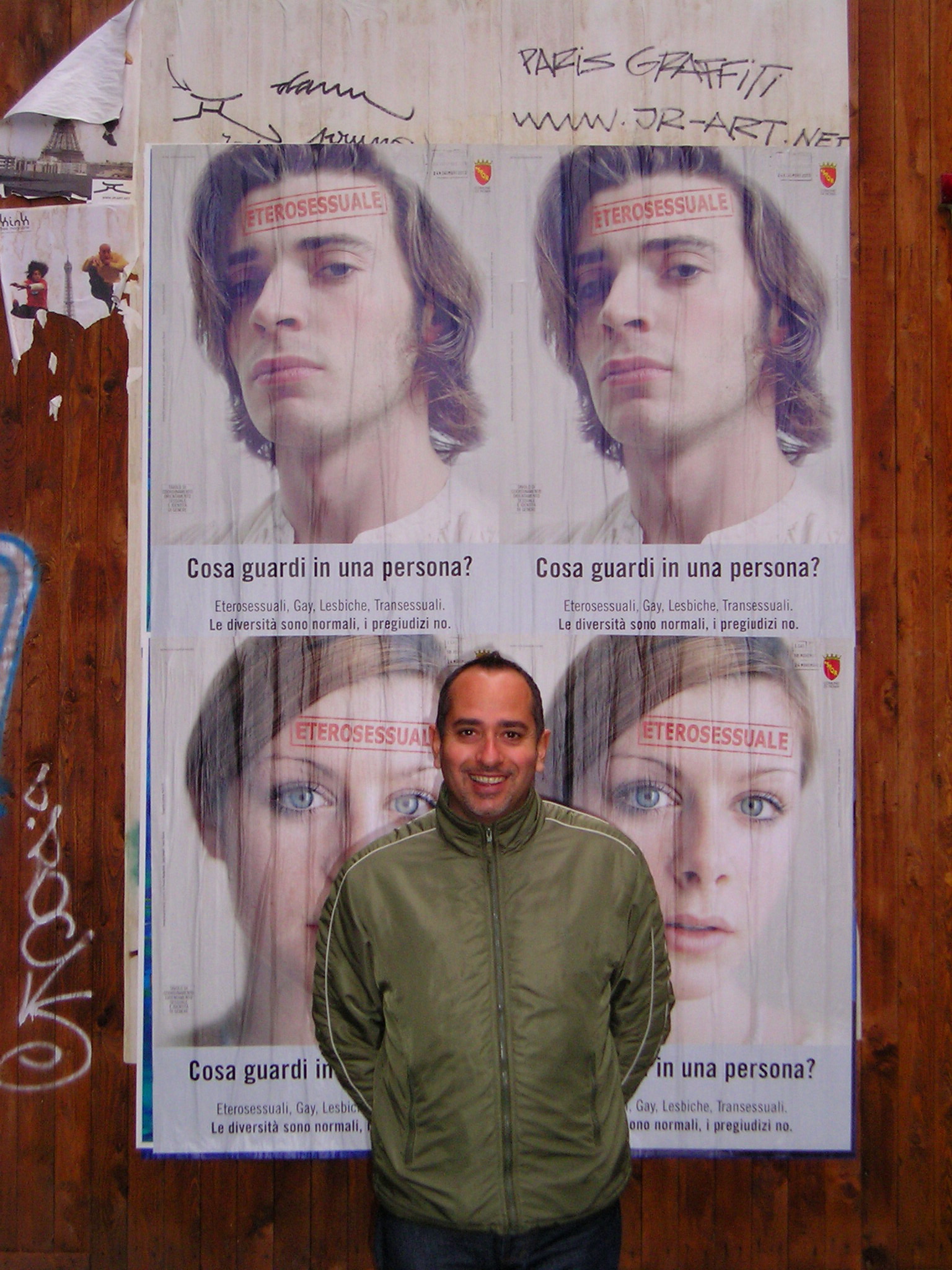 Franco Di Chiera in Rome in front of a poster for the gay anti-discrimination campaign: What do you see in a person? Watch his films and find out. Experience the full range of human emotion - the drama of life. Diversity is the key.