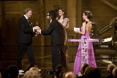 Anthony Dod Mantle accepts the Oscar® for Achievement in cinematography, for work on 