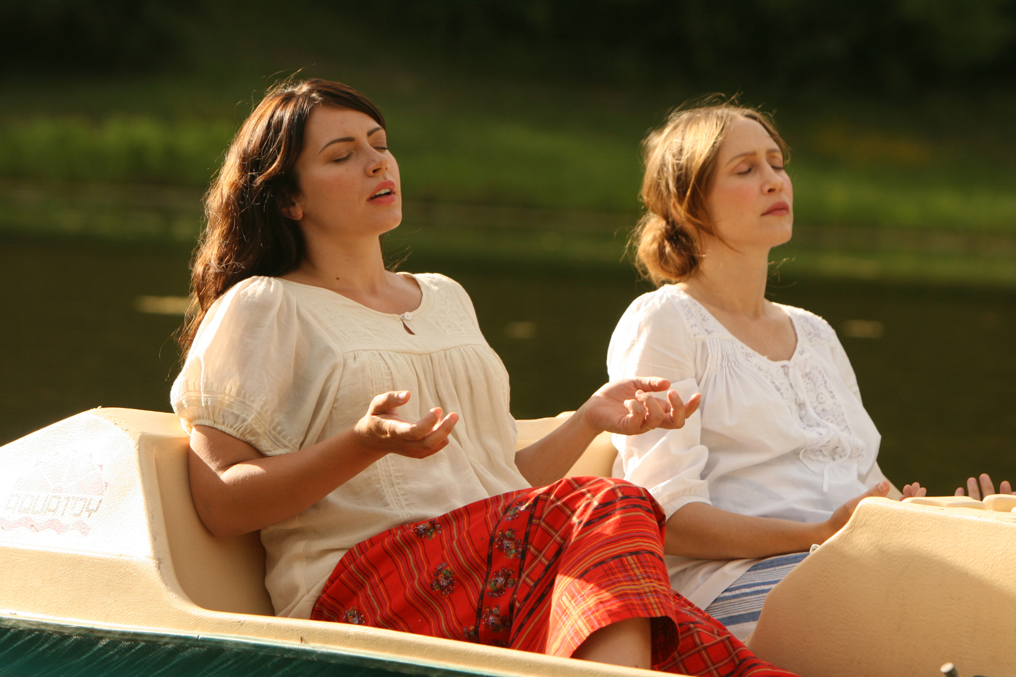 Still of Dagmara Dominczyk and Vera Farmiga in Higher Ground (2011)