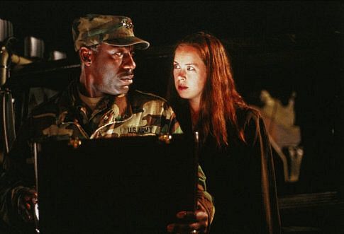 Still of James McDaniel and Heather Donahue in Taken (2002)