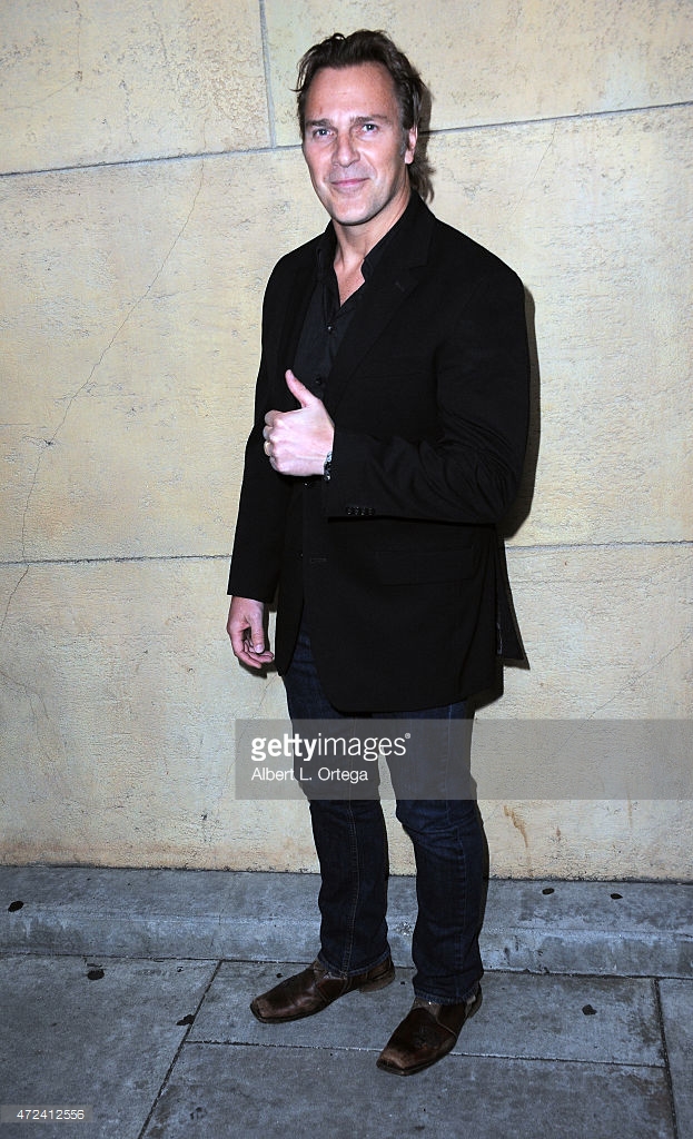 Mike Dopud arrives at the Skin Trade Premiere