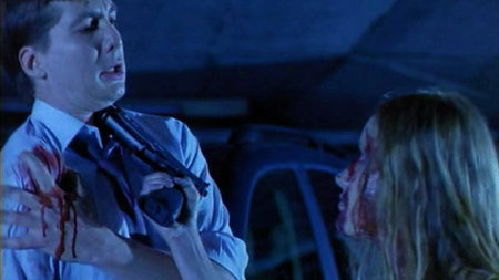 D.C. Douglas and Kim Little in Killers 2: The Beast (2002)
