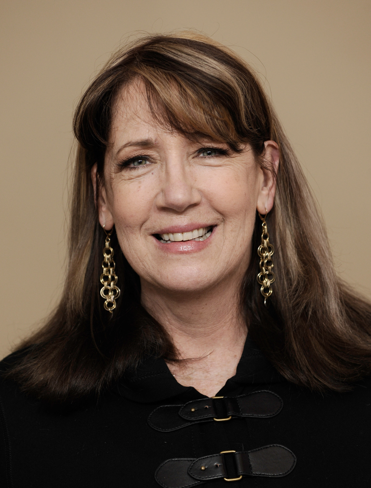 Actress Ann Dowd poses for a portrait during the 2012 Sundance Film Festival at the Getty Images Portrait Studio at T-Mobile Village at the Lift on January 21, 2012 in Park City, Utah.