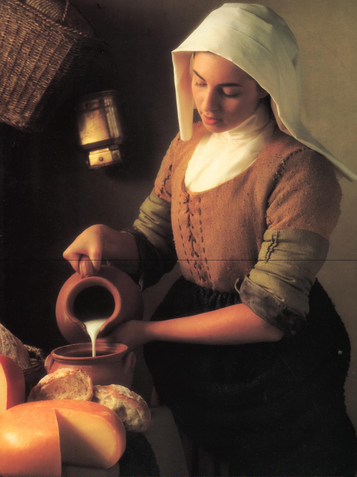 Ellen in an award winning photo duplicating Vermeer's THE MILKMAID for a Holland Cheese ad.