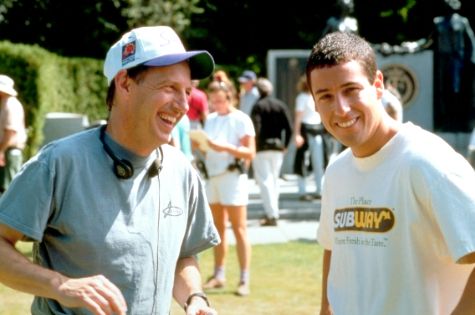 Director Dennis Dugan chats with Adam Sandler.