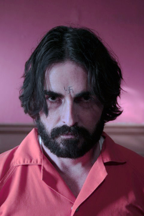 Ian Duncan as Charles Manson in Junkie