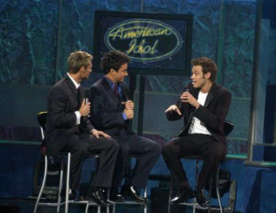 Brian Dunkleman, Ryan Seacrest and Will Young at event of American Idol: The Search for a Superstar (2002)