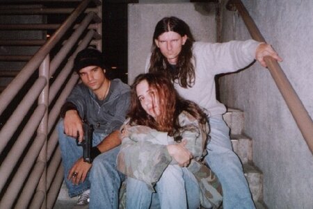 Mace (pictured left: portrayed by Martin Seijo) terrorizes Molly and Jason (Jamie Belanger and Michael Thomas Dunn, respectively) after they witnessed him commit a murder.