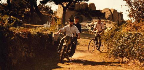 Dominique Pinon (on the motorbike, in front) stars as Sylvain, Jean-Paul Rouve (on the motorbike, behind) stars as The Postman and Albert Dupontel (on the bicycle) stars as Célestin Poux.