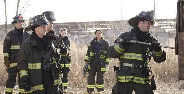 Still of David Eigenberg, Lauren German, Taylor Kinney and Monica Raymund in Chicago Fire (2012)