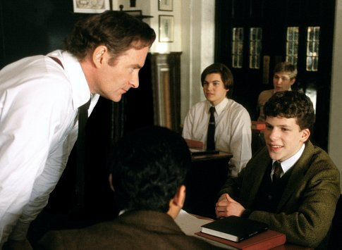 William Hundert (KEVIN KLINE) prepares students, including Fred Masoudi (JESSE EISENBERG, right) and Sedgewick Bell (EMILE HIRSCH, center) for the Mr. Julius Caesar competition at St. Benedict's.