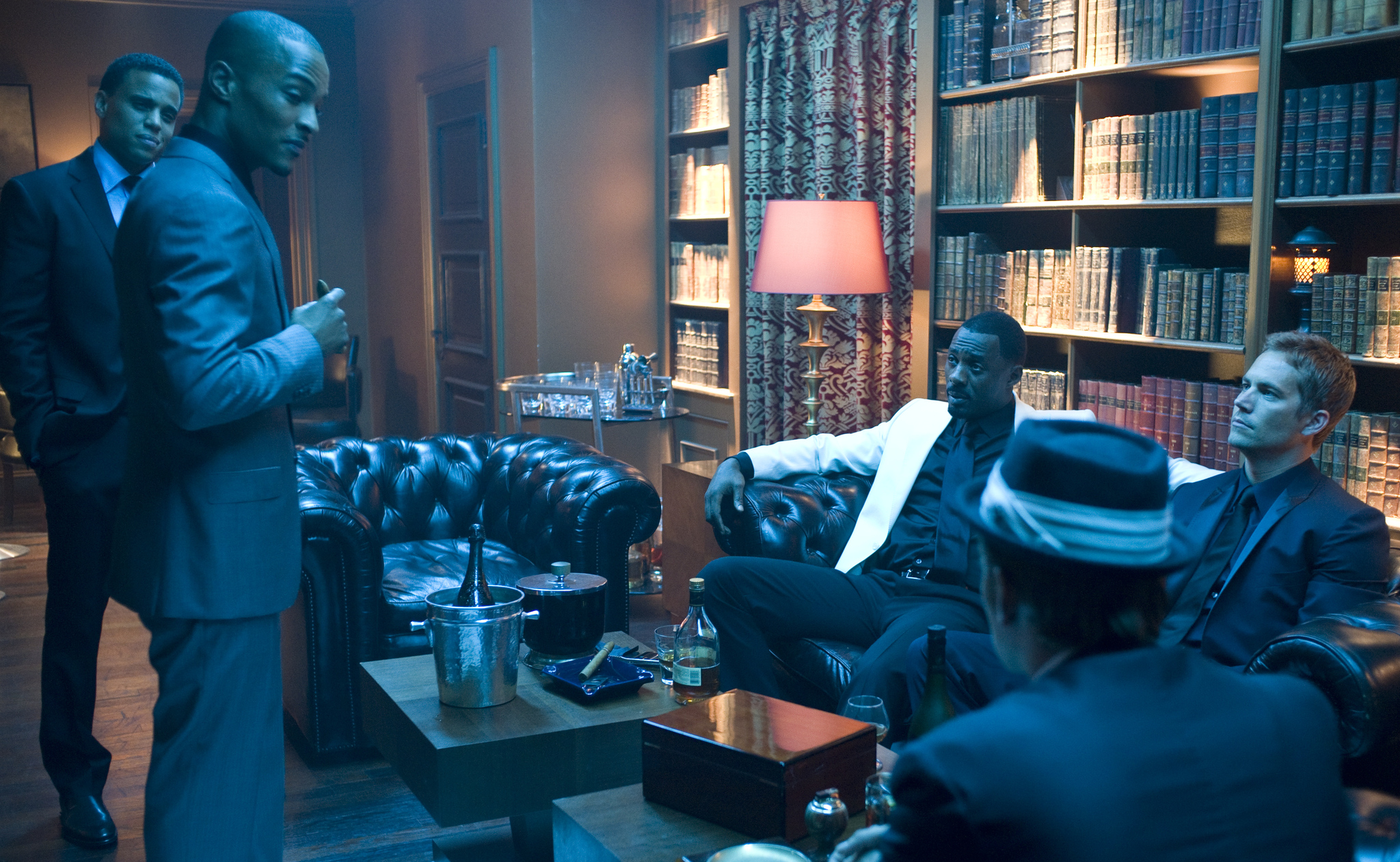 Still of Idris Elba, Paul Walker, Michael Ealy and T.I. in Takers (2010)