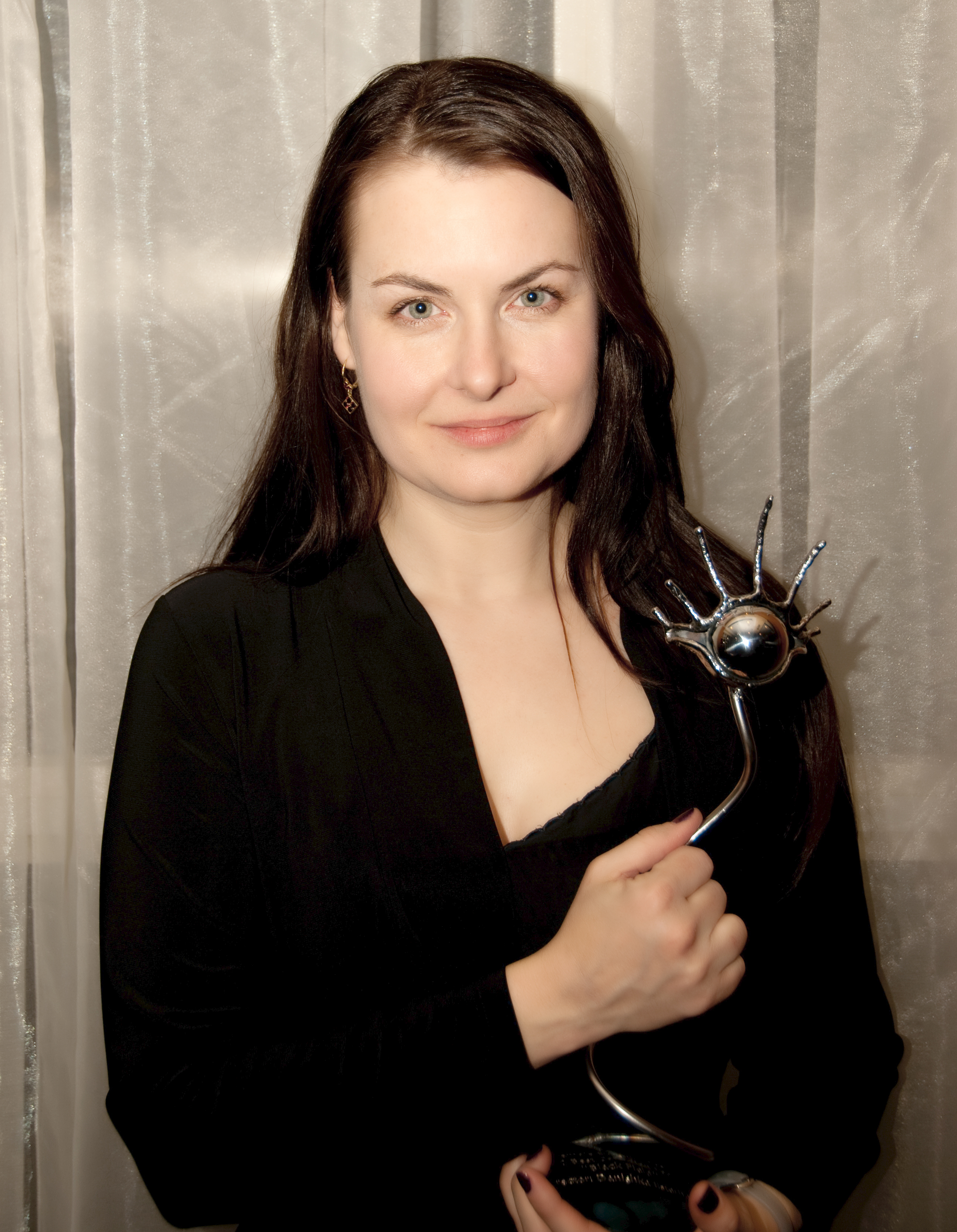 Danishka Esterhazy with award for Best Canadian Feature for her film Black Field. At the Female Eye Film Festival in Toronto. March 2010.