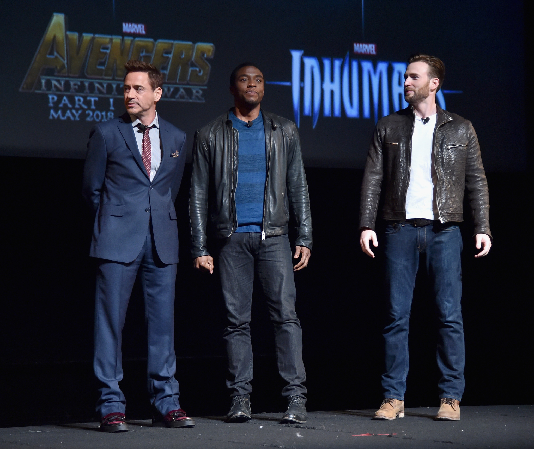 Robert Downey Jr., Chris Evans and Chadwick Boseman at event of Black Panther (2018)