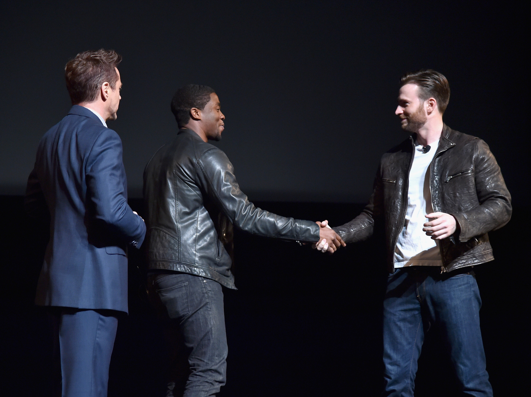 Robert Downey Jr., Chris Evans and Chadwick Boseman at event of Black Panther (2018)