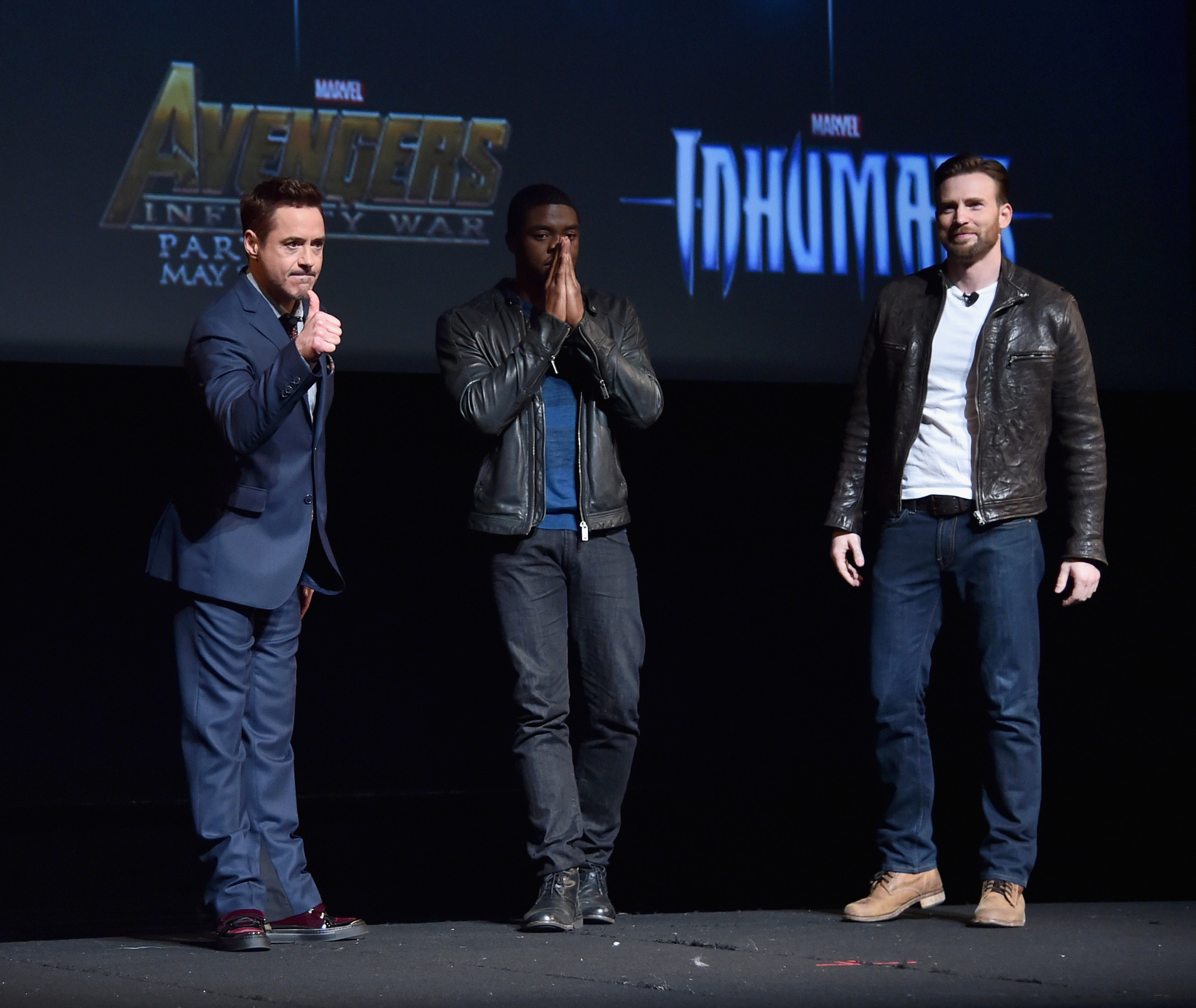 Robert Downey Jr., Chris Evans and Chadwick Boseman at event of Black Panther (2018)