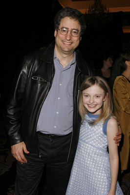 Dakota Fanning and Tom Rothman