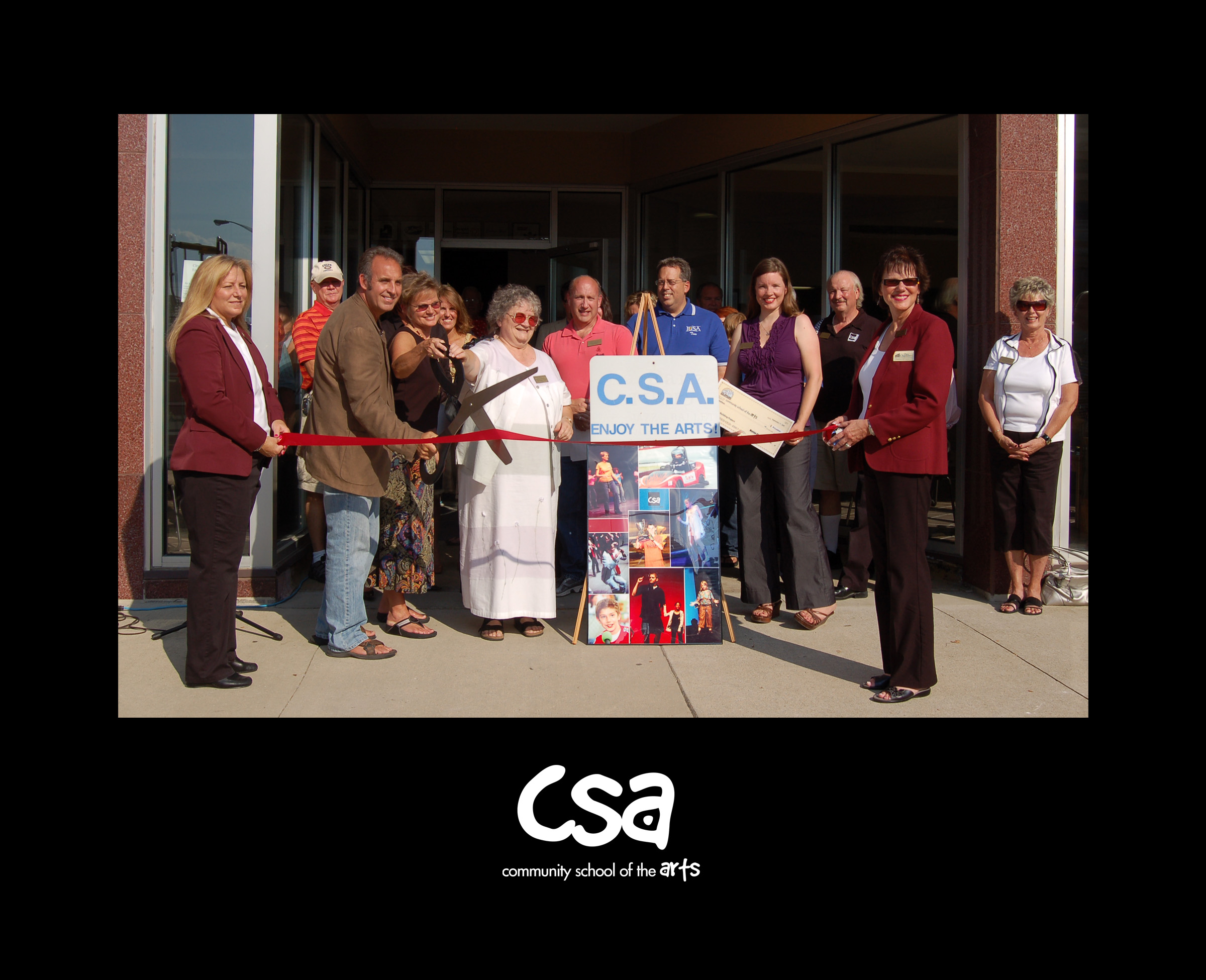 Mark Fauser and community members opening up The Community School of the Arts in Marion Indiana.