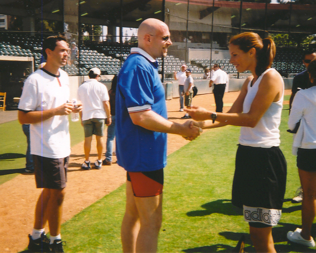 Molly Culver and Ken Feinberg after the celebrity softball fundraiser for homeless animals.
