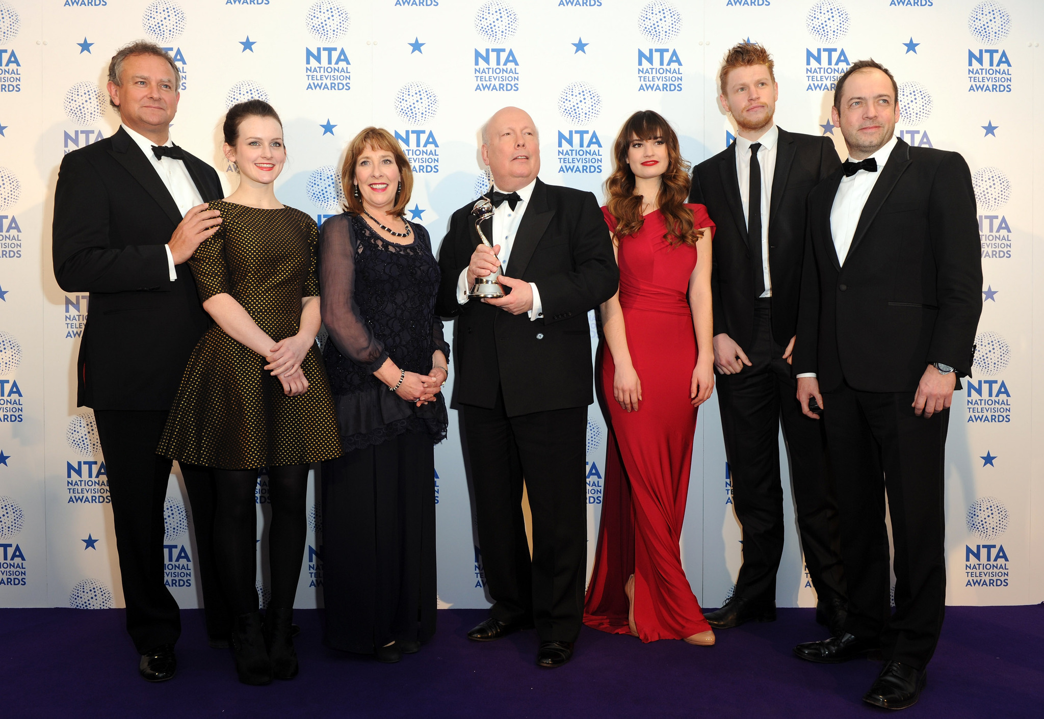 Hugh Bonneville, Sophie McShera, Phyllis Logan, creator Julian Fellowes, Lily James, winner of Drama award for 