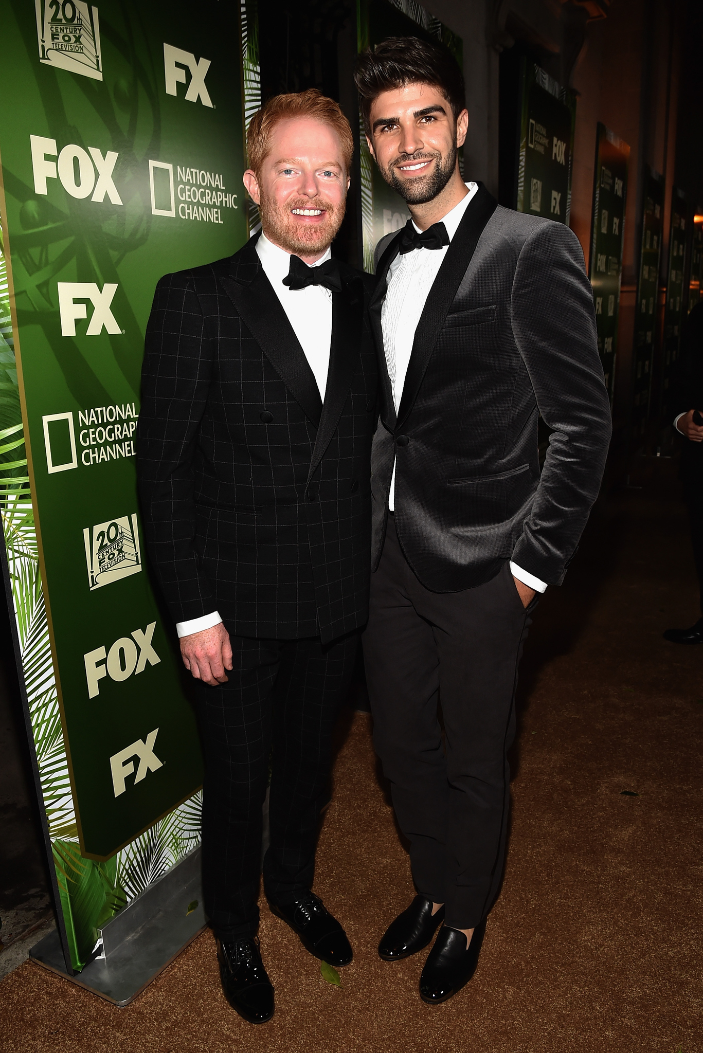 Jesse Tyler Ferguson and Justin Mikita at event of The 66th Primetime Emmy Awards (2014)