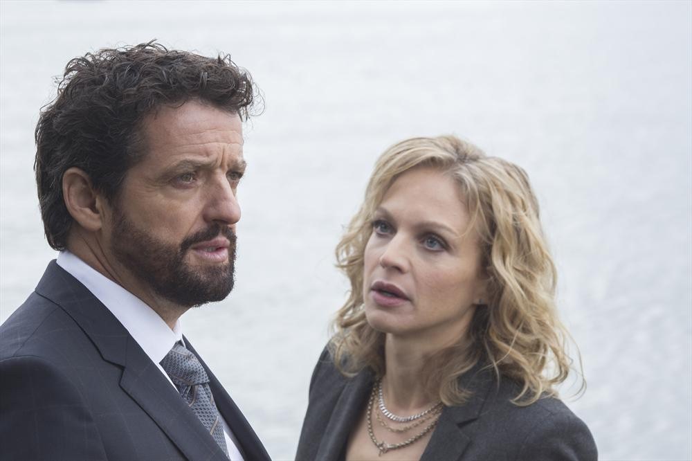 Still of Kristin Lehman and Louis Ferreira in Motive (2013)