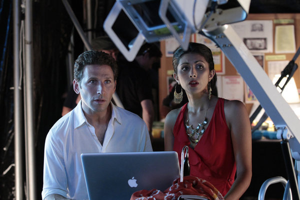 Still of Mark Feuerstein and Reshma Shetty in Royal Pains: Bottoms Up (2012)