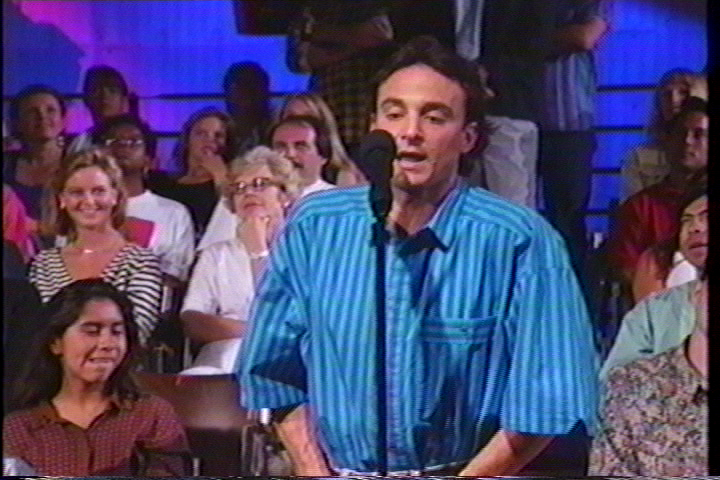 Alan Fine performing in a sketch on 