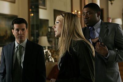 Still of Jennifer Finnigan and Cress Williams in Close to Home (2005)