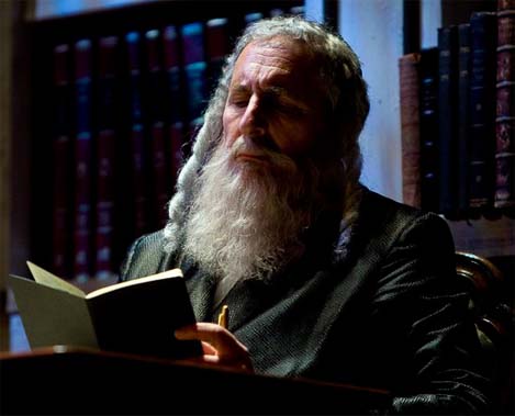 Corey Fischer as Rabbi Saunders in 