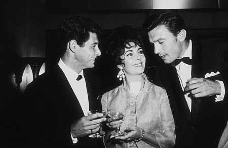 Eddie Fisher, Elizabeth Taylor and Laurence Harvey at a party thrown by Eddie Fisher at the Coconut Grove C. 1960