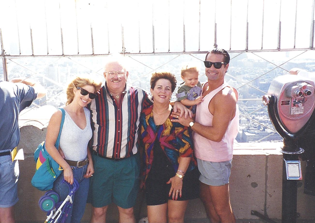 High atop the Empire State Building in NYC, are actors Jodi Knotts (L) and Jim Fitzpatrick (R) and their family, during Fitzpatrick's 2 years on 