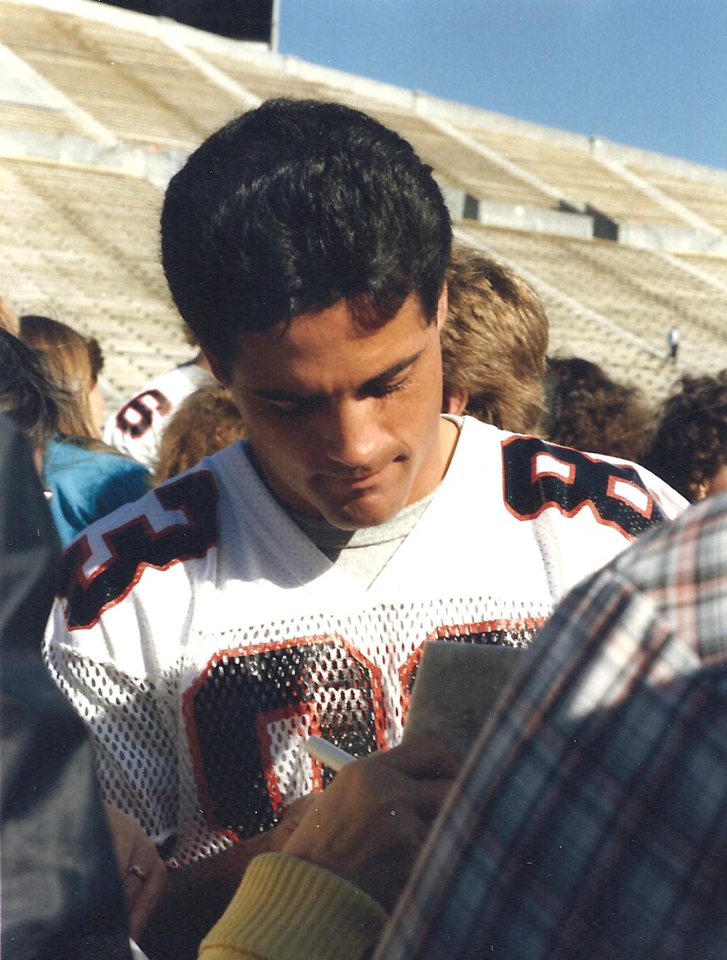 Tampa Bay WR Jim Fitzpatrick, signing autographs at Burt's Bash, before the first home game, in 1983