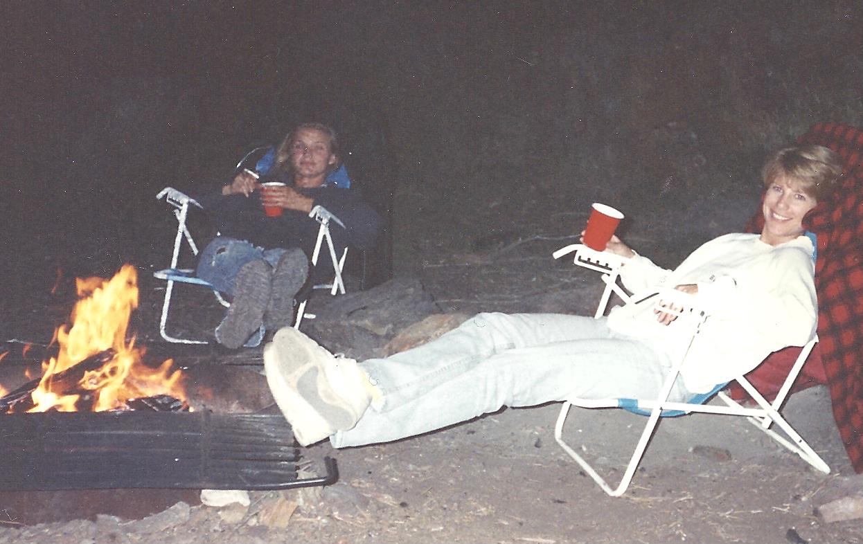 L-R Cameron Diaz and Jodi Knotts relaxing by the fire on the Kern River in 1992