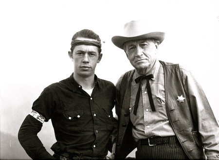Publicity Photo of Ghost Town in the Sky Theme Park. Paul Fix visits Ghost Town as a celibrity gunfighter in 1962. Pictured with him is 