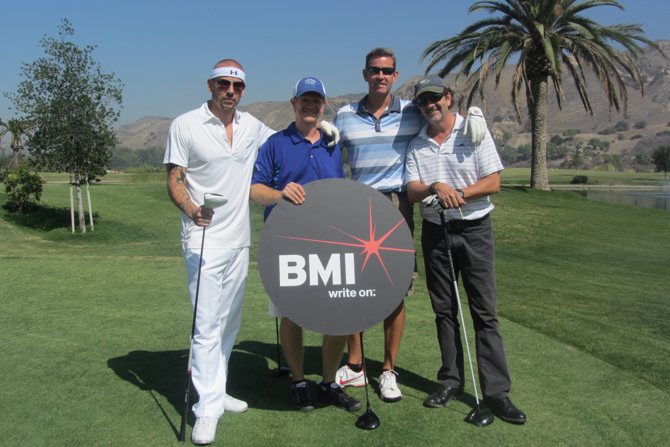 BMI/Mr Holland's Opus annual golf charity event: !st place, 11 under par. From left Matt Koskenmaki, Dave Reynolds Eric Colvin and Claude Foisy