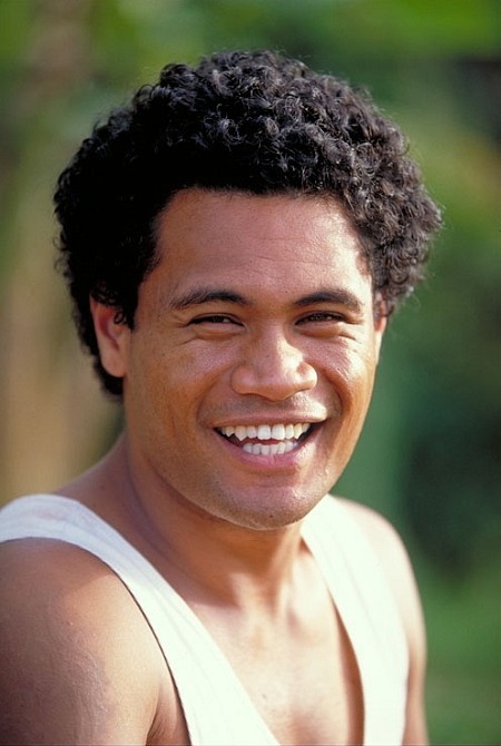 JOE FOLAU is Feki, the good-natured and resourceful Tongan friend of John Groberg in the true adventure story THE OTHER SIDE OF HEAVEN. (Photo courtesy of 3Mark Entertainment.)