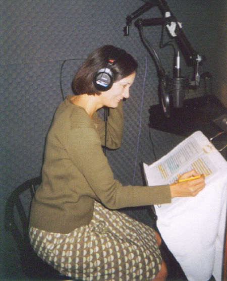 Deborah Smith Ford, as Judith Bunker, reviewing script in recording studio
