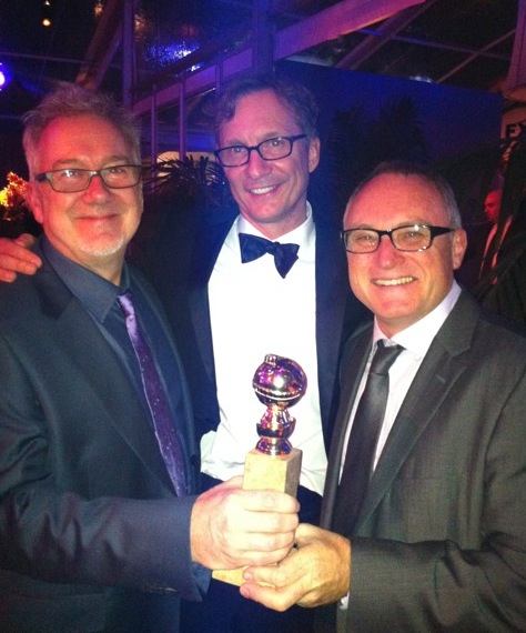 Richard Ford with Jim Burke [producer] and Kevin Tent [film editor]. The Descendants wins Golden Globe best motion picture [drama] 2012