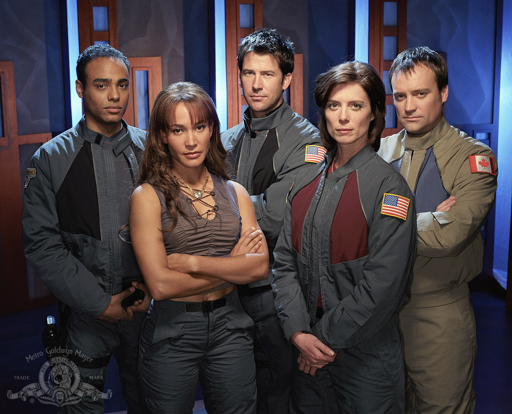 Still of Joe Flanigan, Rainbow Francks, David Hewlett, Torri Higginson and Rachel Luttrell in Stargate: Atlantis (2004)