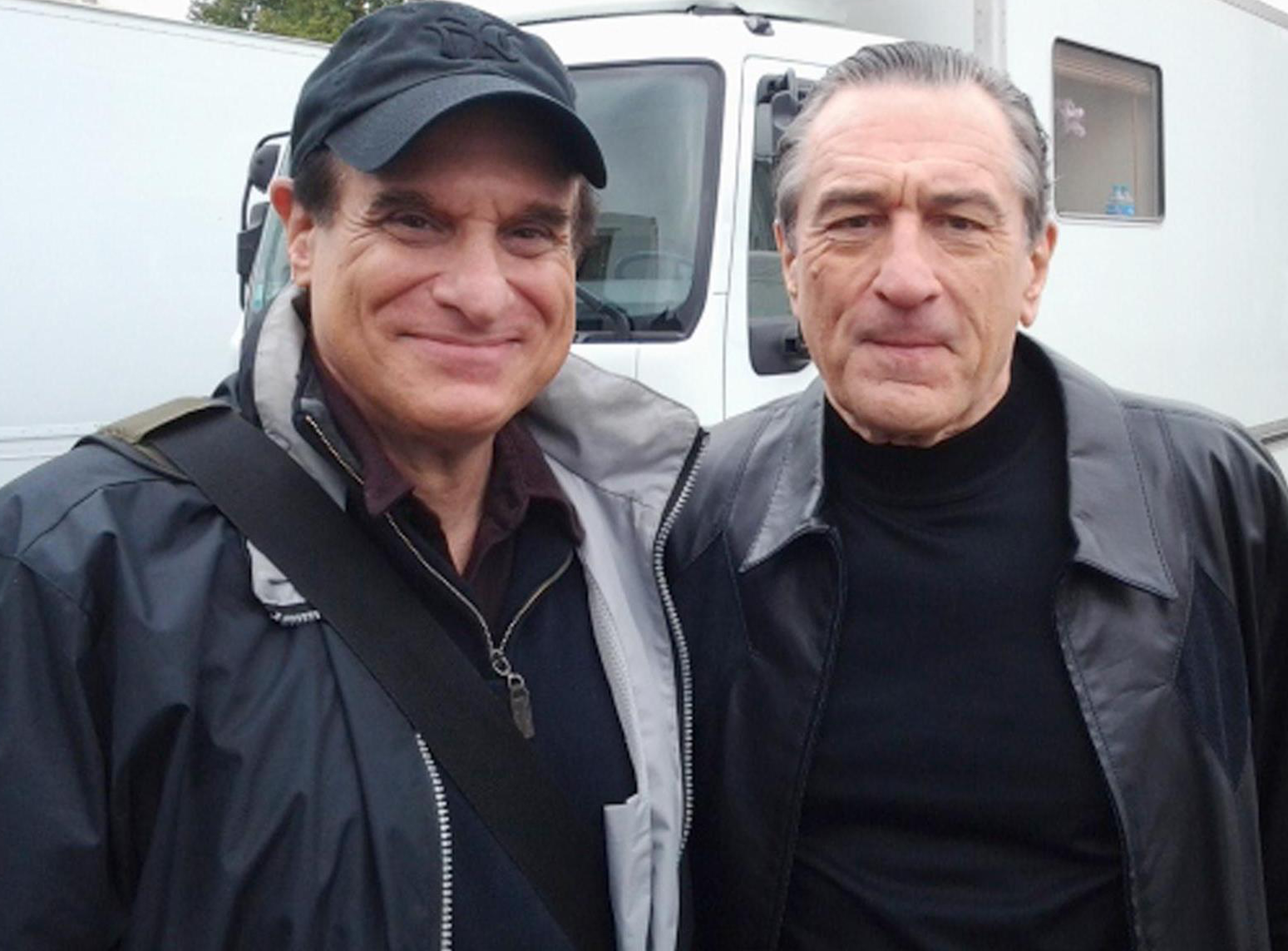 Jon Freda and Robert De Niro on set of THE FAMILY