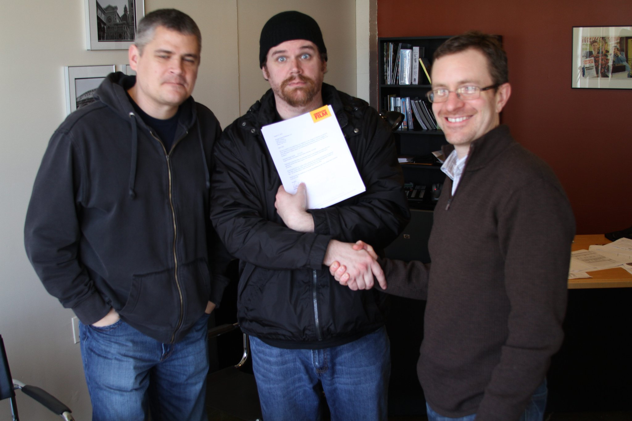 Posing with signed iOPIF paperwork with Oregon Film Office Director Vince Porter.