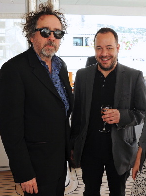 (L to R) Director Tim Burton and Producer Derek Frey attend a lunch hosted by Len Blavatnik, Harvey Weinstein and Warner Music during the 66th Cannes Film Festival on board the Odessa at Old Port on May 19, 2013