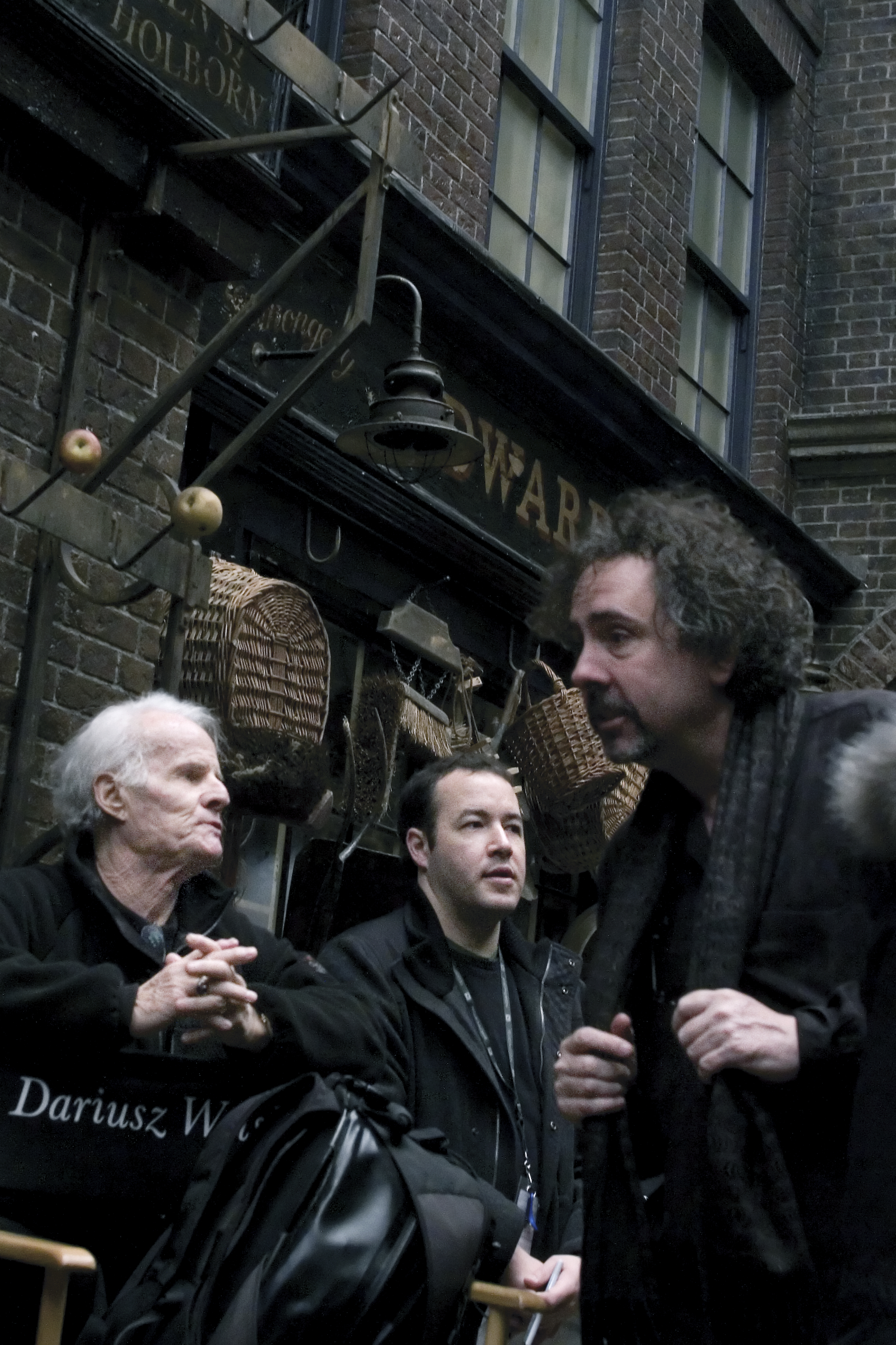 Richard Zanuck, Derek Frey & Tim Burton - on the set of Sweeney Todd: The Demon Barber of Fleet Street.